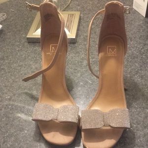 Size 9 and a half, material girls heels.